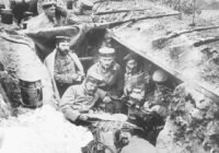 A quiet moment in German trenches. German soldiers smoking and reading in a trench in Flanders, Belgium, during World War I.