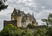 grey concrete castle under grey sky